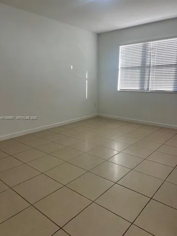 a view of a room and window