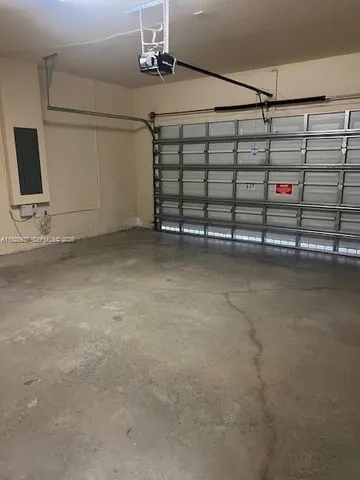 a view of a garage with storage