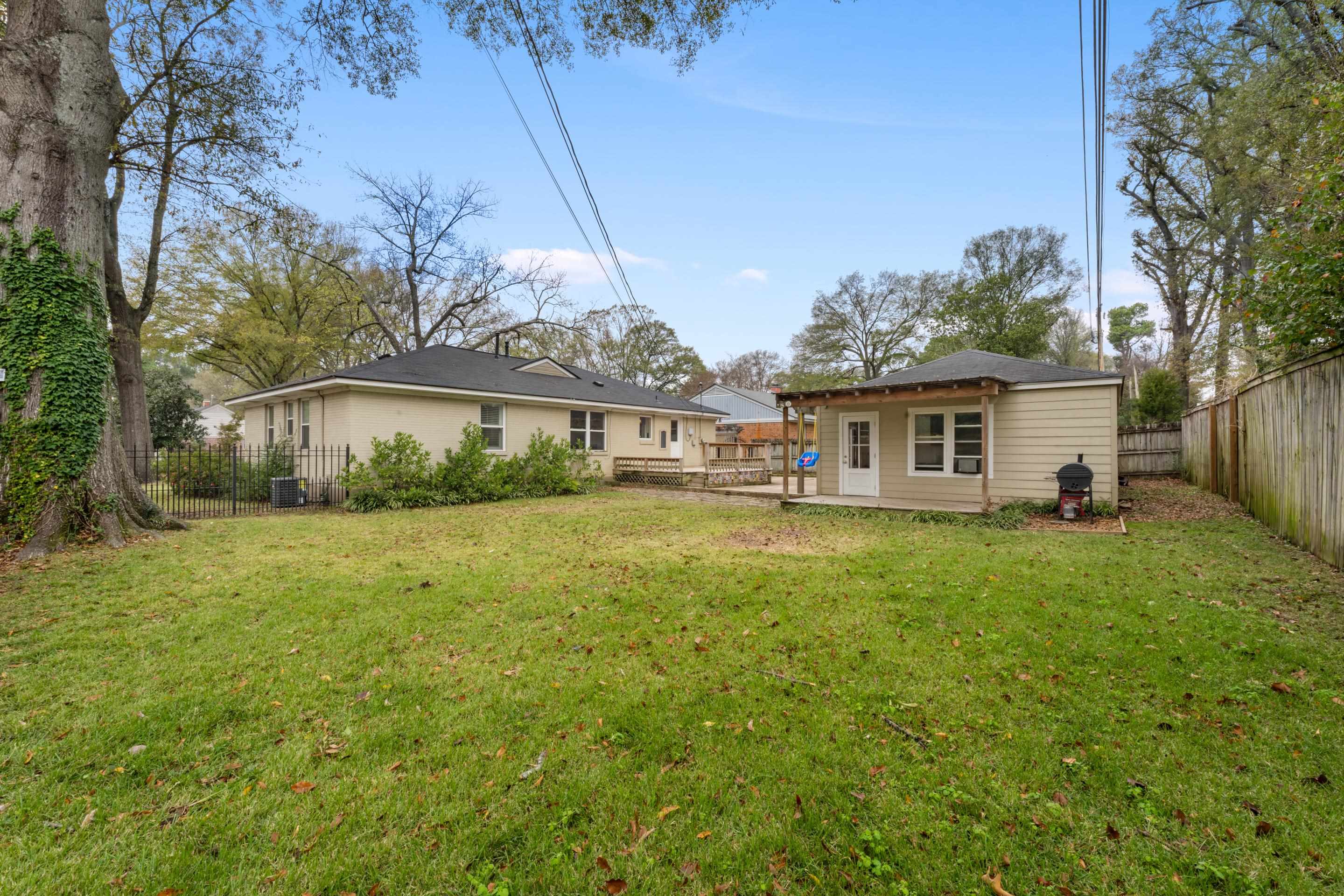 400 Rosser Road Memphis, TN 38120 - Photo 24 of 26 a front view of a house with a yard