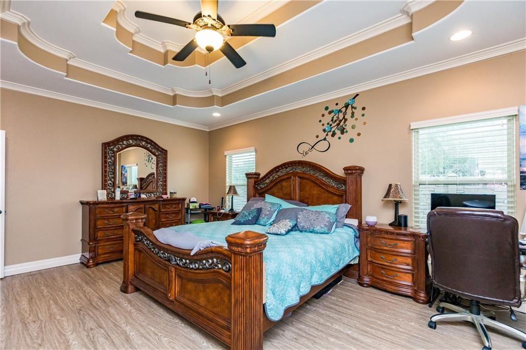 1306 Keenland Road Corpus Christi, TX 78418 - Photo 11 of 26 a bedroom with bed and a window