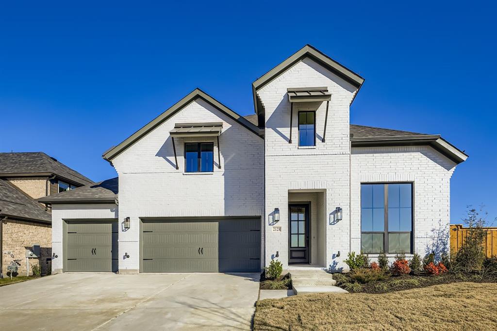 2128 Ten Mile Crk Road Celina, TX 75009 - Photo 1 of 1 a front view of a house with a yard