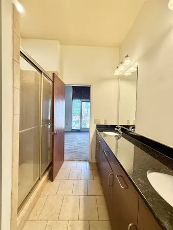 a view of a balcony with car parked