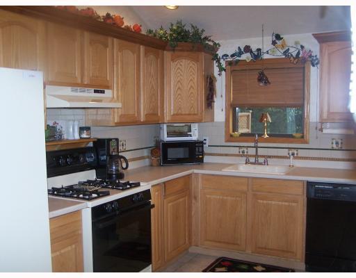 269 Olympic Road Baldwin, PA 15236 - Photo 3 of 12 Kitchen. Awesome and more! Ceramic flooring, new cabinets, custom sink and faucet! Seeing is beleiving!