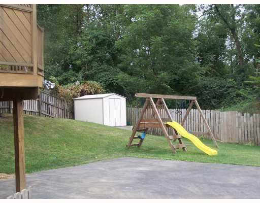 269 Olympic Road Baldwin, PA 15236 - Photo 10 of 12 Yard/Garden. Completely fenced rear yard-gate closes at back of driveway. Storage shed in left corner for outdoor equipment.Nicely framed with shrubbery and trees.