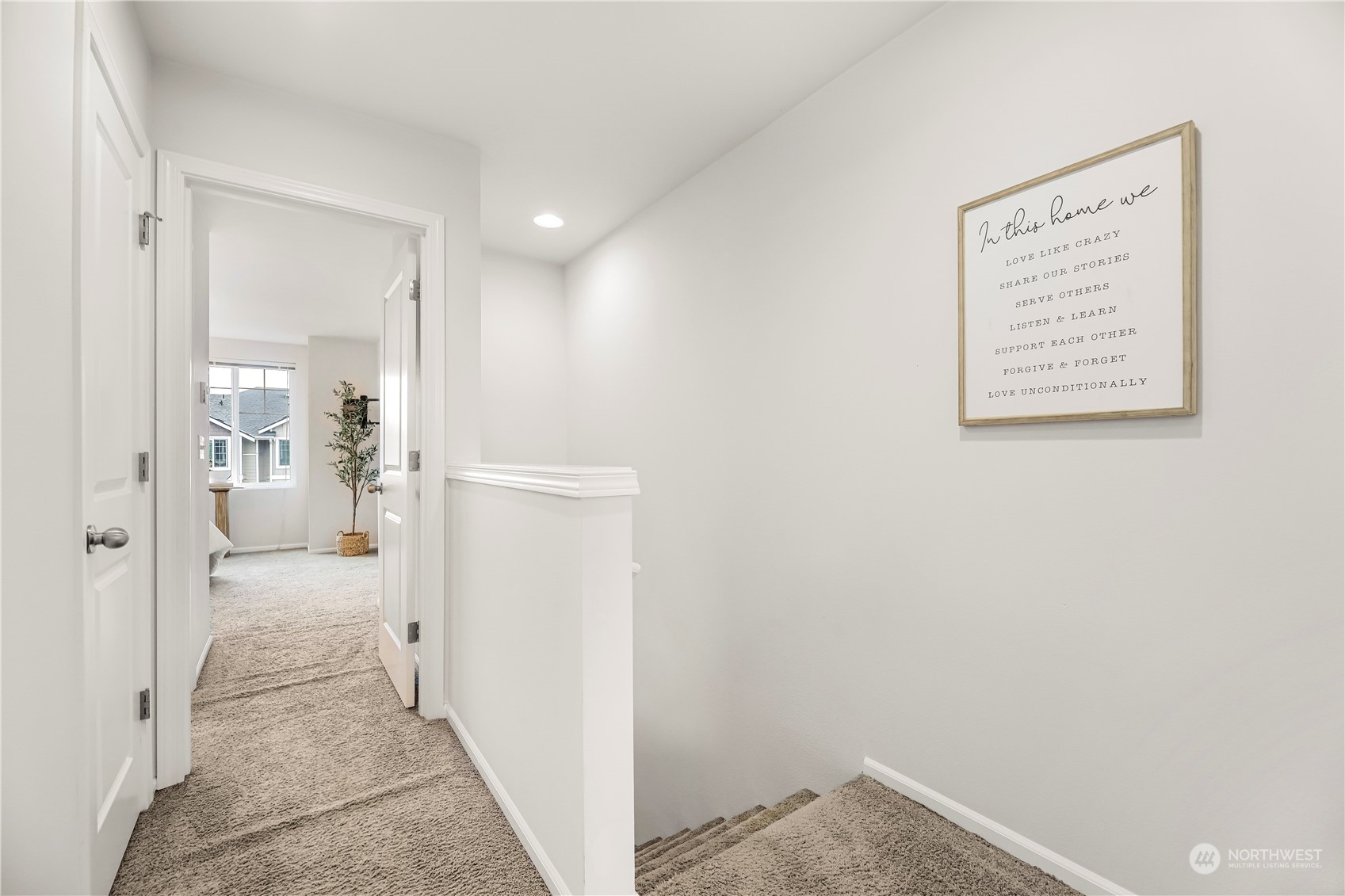 3345 30th Drive Everett, WA 98201 - Photo 16 of 37 a view of a hallway with white walls and windows