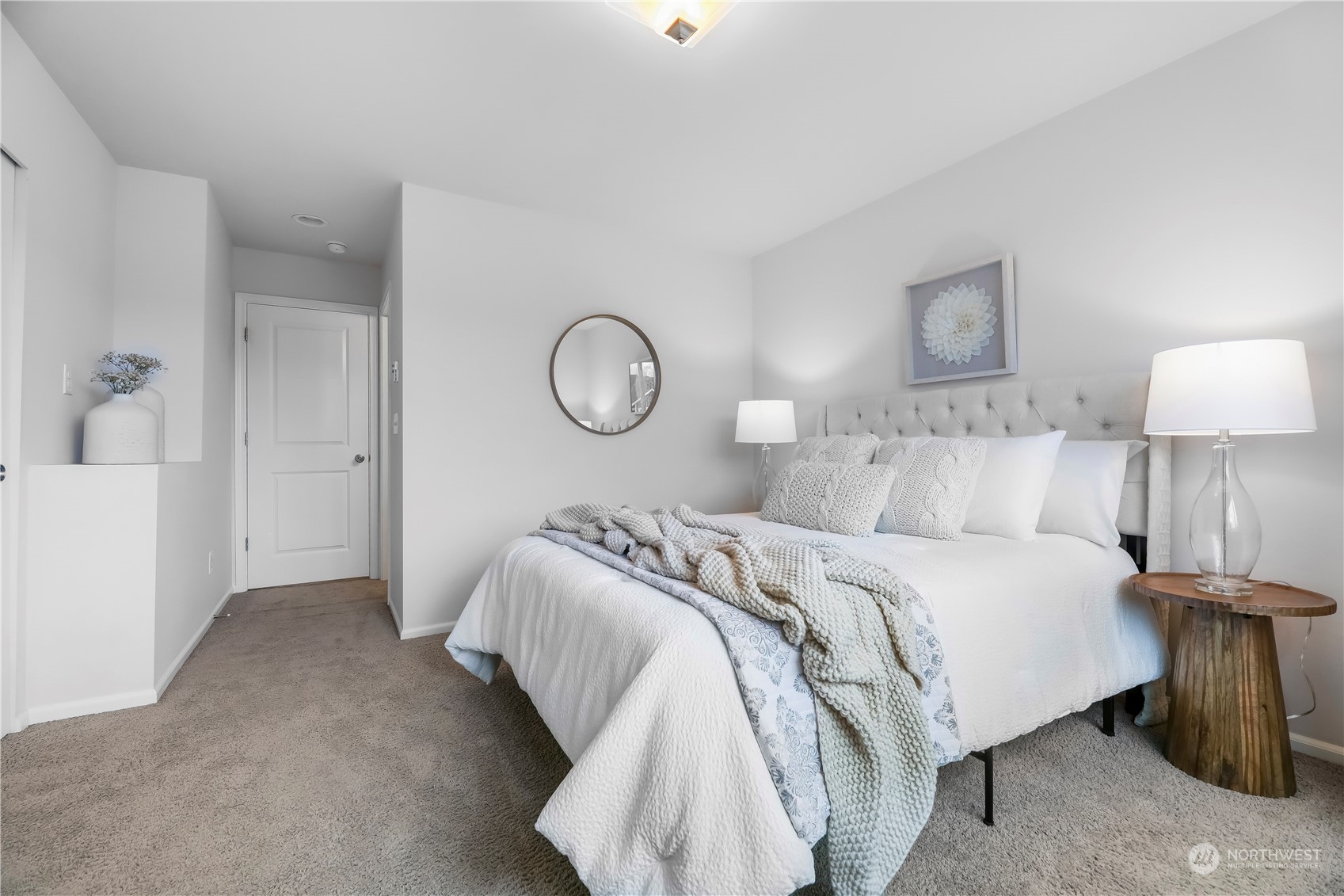 3345 30th Drive Everett, WA 98201 - Photo 18 of 37 a bedroom with a bed and a lamp