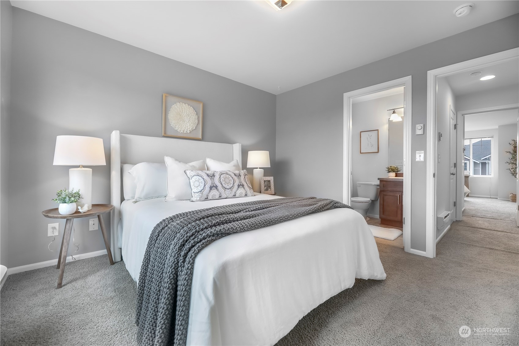 3345 30th Drive Everett, WA 98201 - Photo 22 of 37 a bedroom with a bed and a lamp