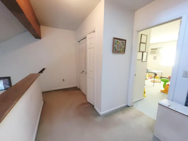 a view of a workspace with furniture