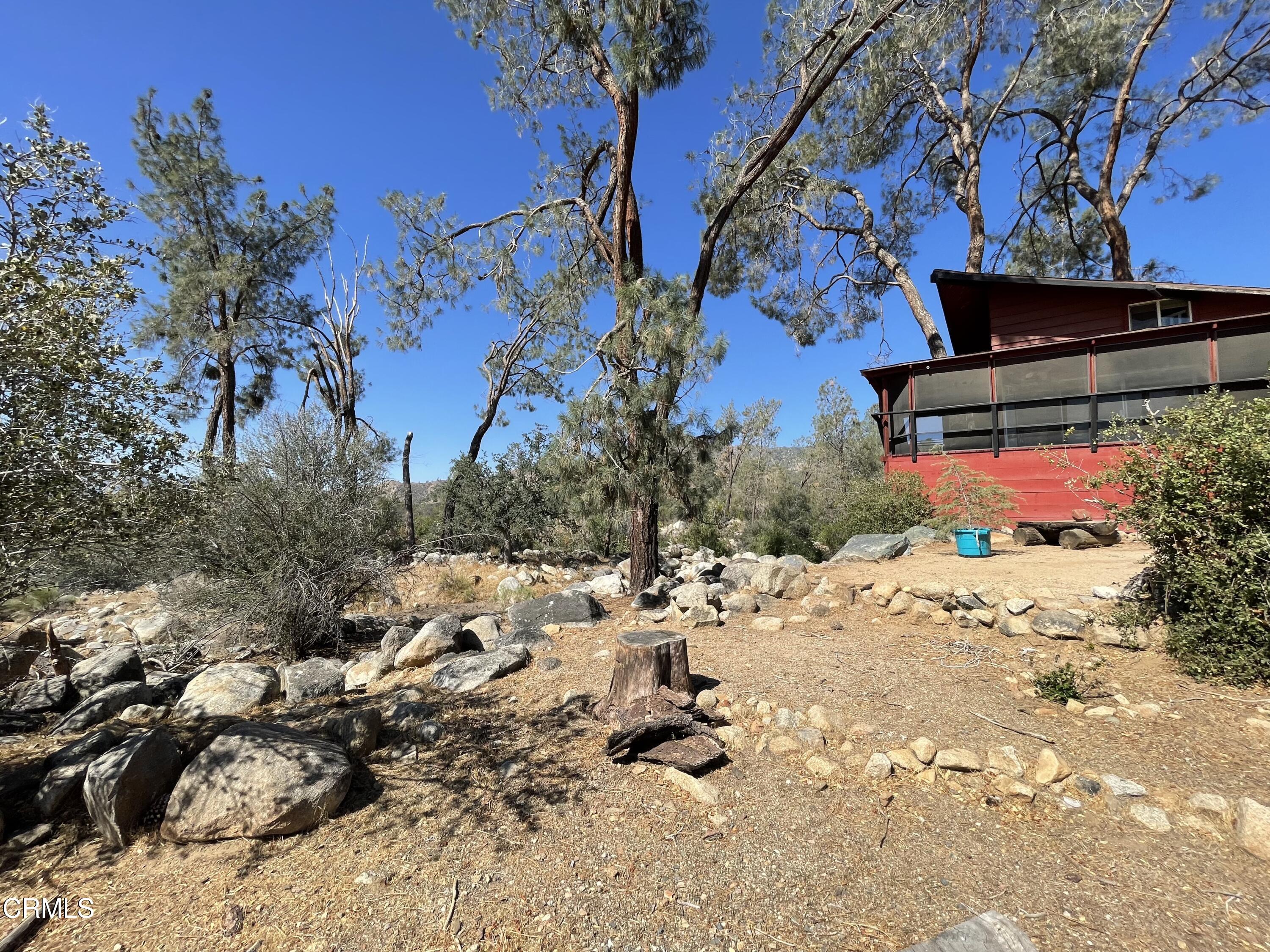 253 Evans Road Wofford Heights, CA 93285 - Photo 8 of 13 a view of a backyard of a house