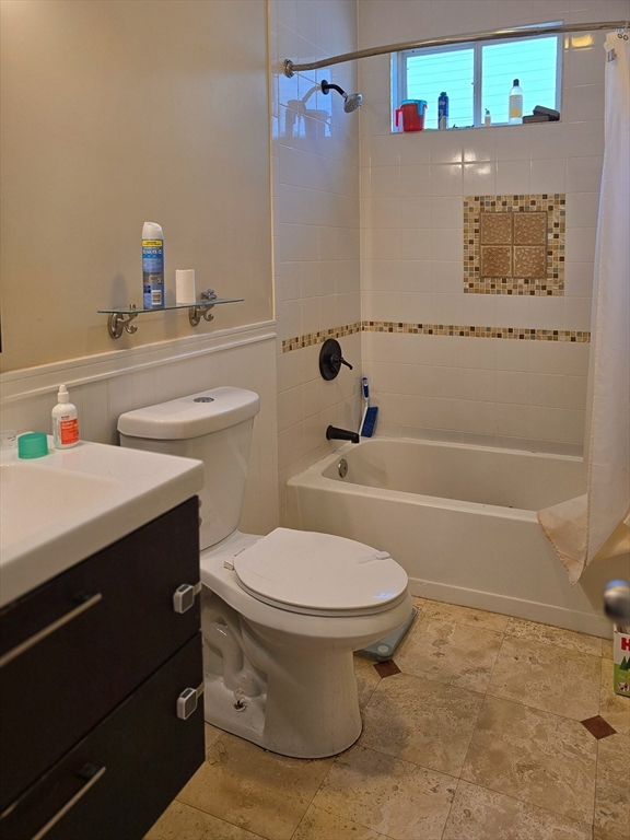 23 Ralph Piteri Terrace, Unit 3 Watertown, MA 02472 - Photo 6 of 7 a bathroom with a sink toilet and shower