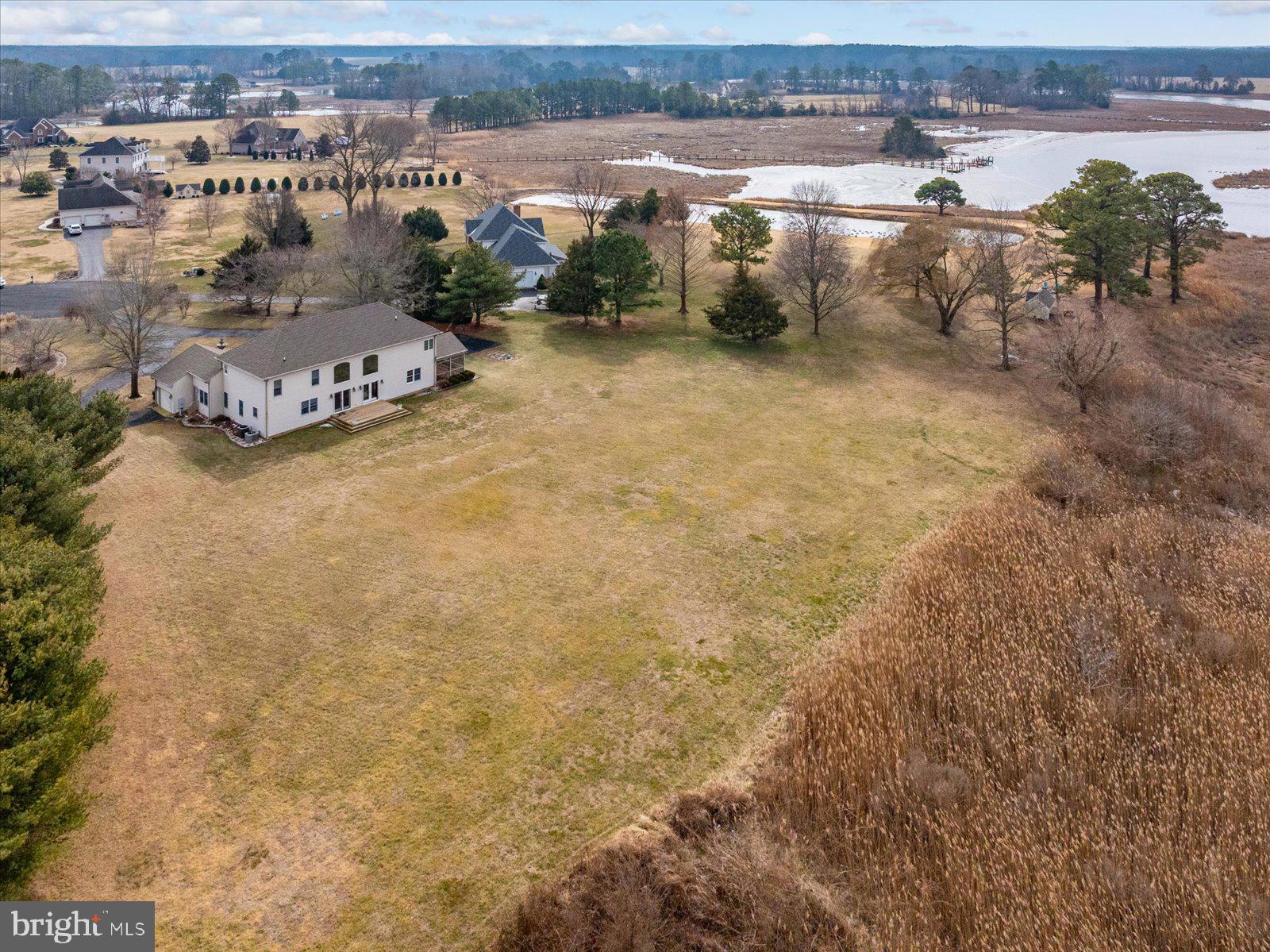 12661 Mallard Landing Road Princess Anne, MD 21853 - Photo 105 of 123 an aerial view of a houses with a lake view