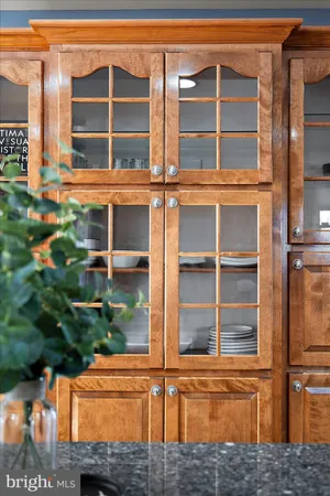 a view of a room with furniture and window