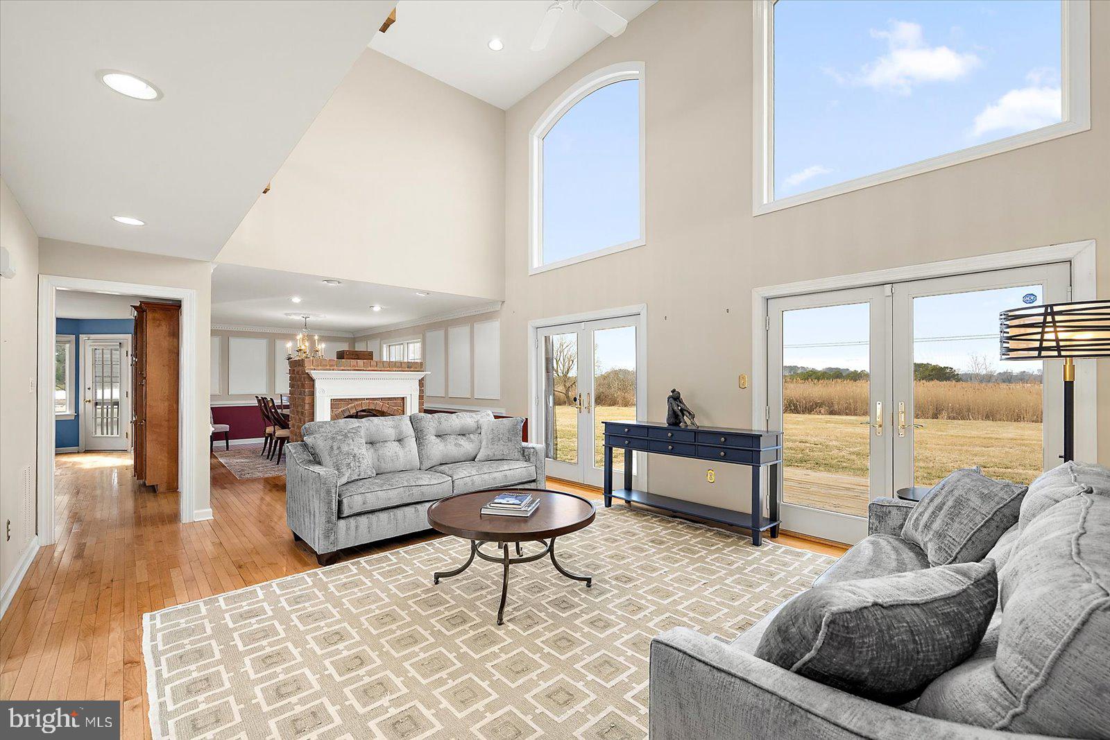12661 Mallard Landing Road Princess Anne, MD 21853 - Photo 30 of 123 a living room with furniture and a large window