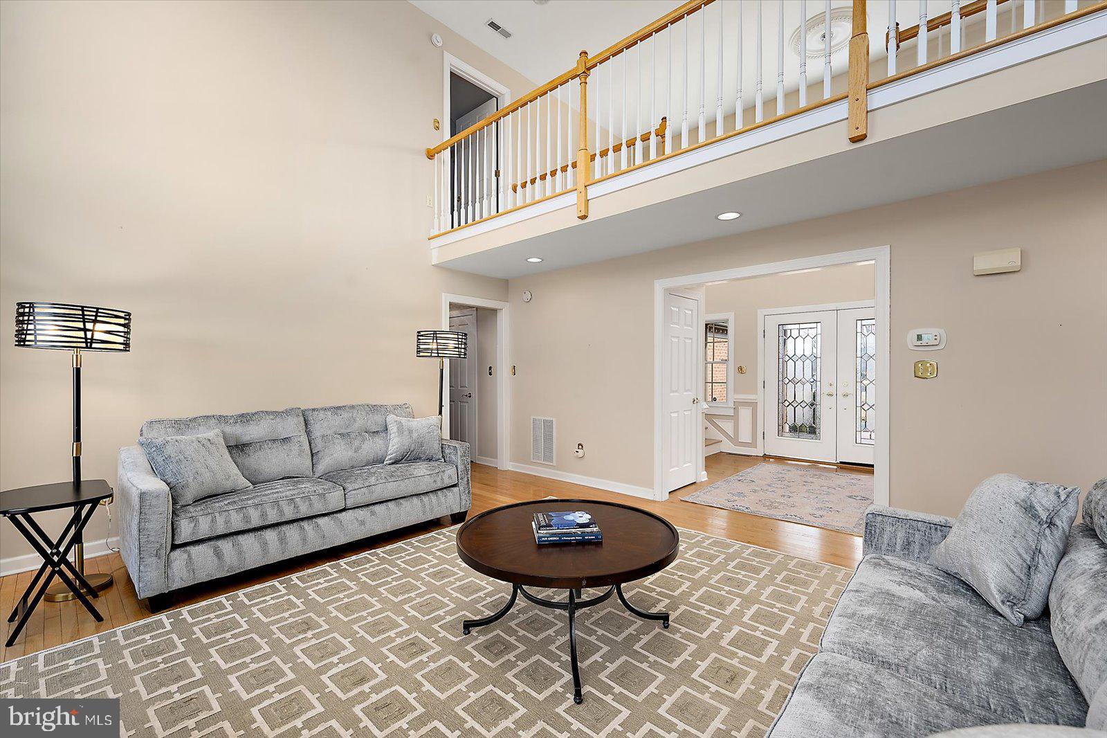 12661 Mallard Landing Road Princess Anne, MD 21853 - Photo 32 of 123 a living room with furniture and a rug