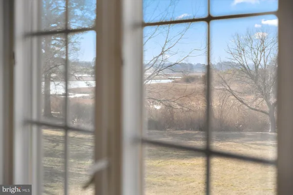 a living room with furniture fireplace and a flat screen tv