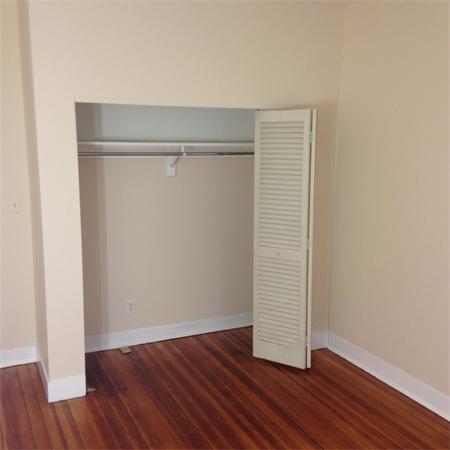 46 Orkney Road, Unit 1 Boston, MA 02135 - Photo 7 of 12 a view of an empty room with wooden floor