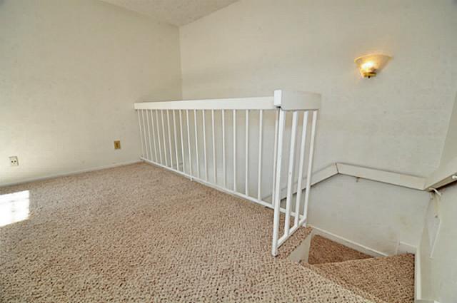 2610 Lakehill Lane, Unit 6B Carrollton, TX 75006 - Photo 11 of 18 a view of a room with white walls