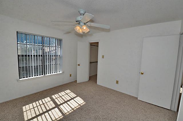 2610 Lakehill Lane, Unit 6B Carrollton, TX 75006 - Photo 14 of 18 a view of an empty room with a window