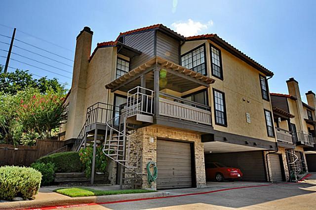 2610 Lakehill Lane, Unit 6B Carrollton, TX 75006 - Photo 2 of 18 a view of a house with a street