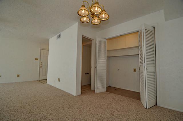 2610 Lakehill Lane, Unit 6B Carrollton, TX 75006 - Photo 10 of 18 a view of an empty room with a window