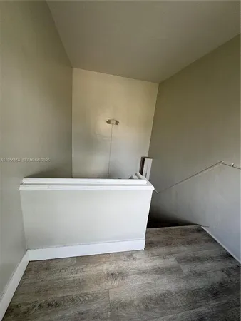 a white tub sitting in a bathroom