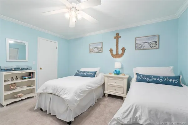 a bedroom with a bed and a cabinets