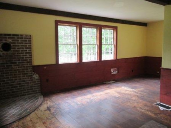 63 Spring Hill Road Barre, MA 01005 - Photo 4 of 14 a view of an empty room with windows
