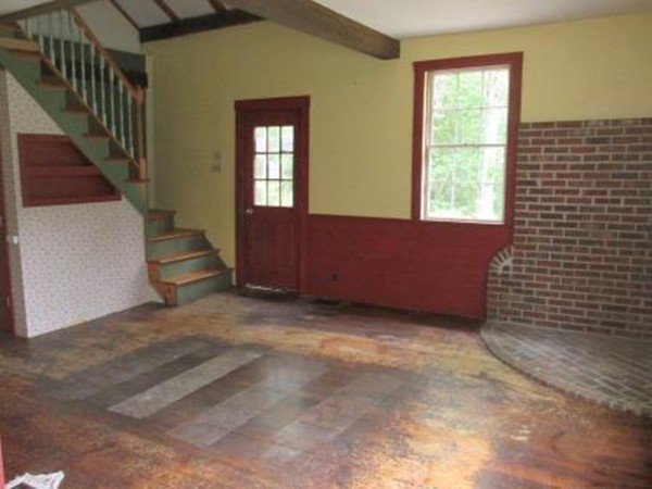 63 Spring Hill Road Barre, MA 01005 - Photo 5 of 14 a view of an empty room with wooden floor and a window