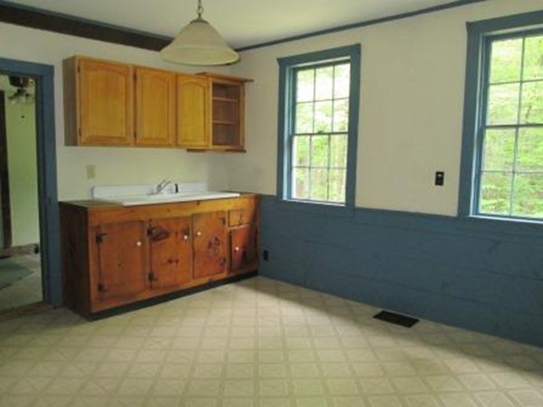 63 Spring Hill Road Barre, MA 01005 - Photo 6 of 14 a room with a bed and a window