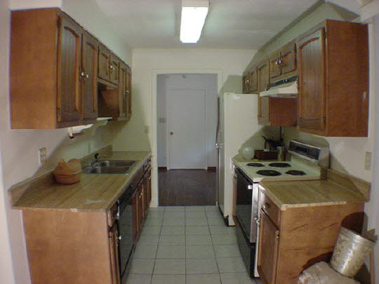 5016 Highcrest Road Rockford, IL 61107 - Photo 4 of 6 a kitchen with a stove and a sink