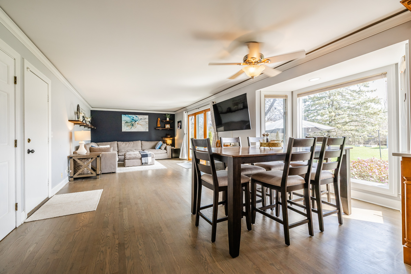 8001 William Drive Willowbrook, IL 60527 - Photo 11 of 73 a view of a dining room with furniture window and wooden floor