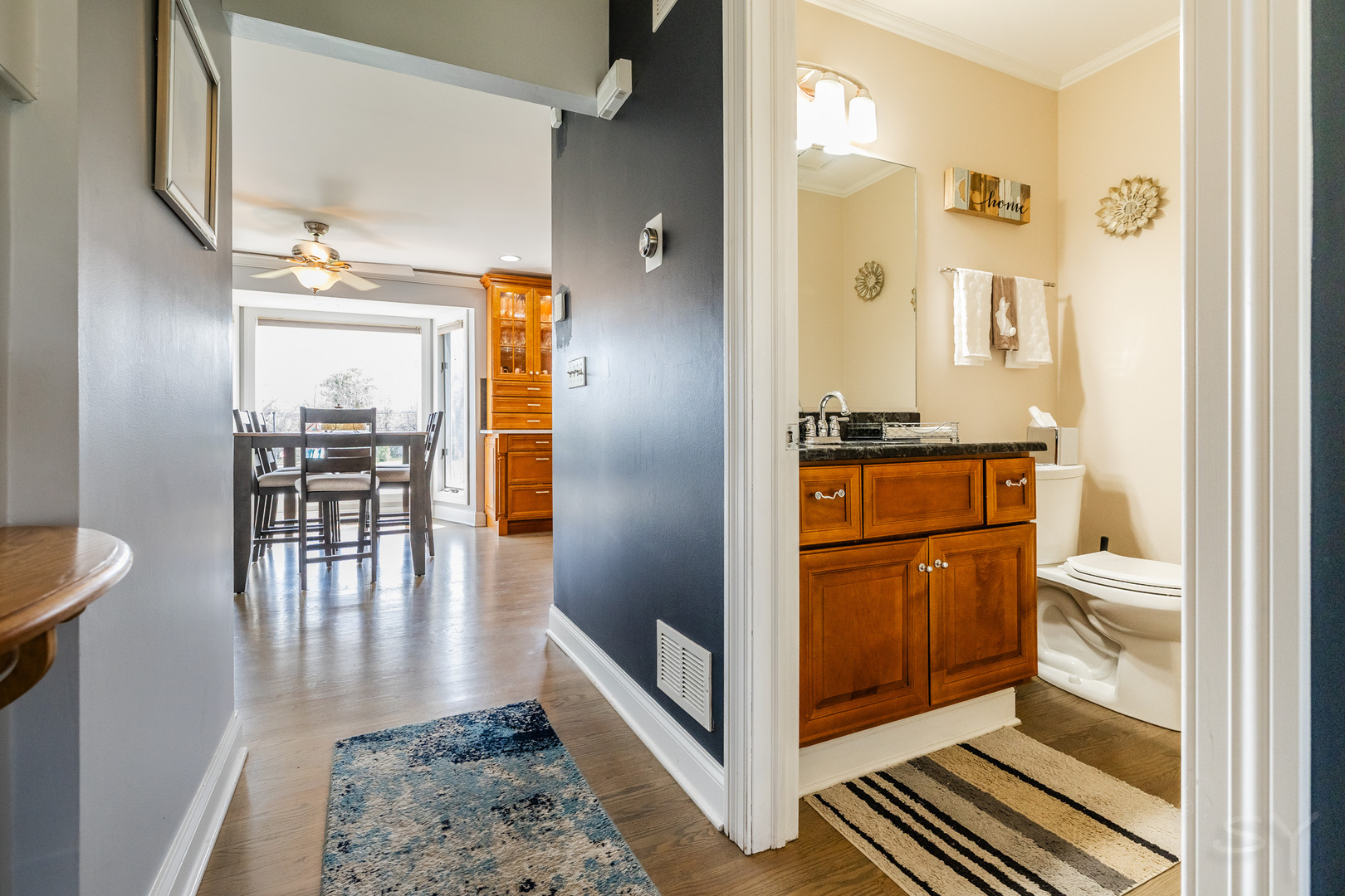 8001 William Drive Willowbrook, IL 60527 - Photo 19 of 73 a bathroom with a sink a mirror and a shower