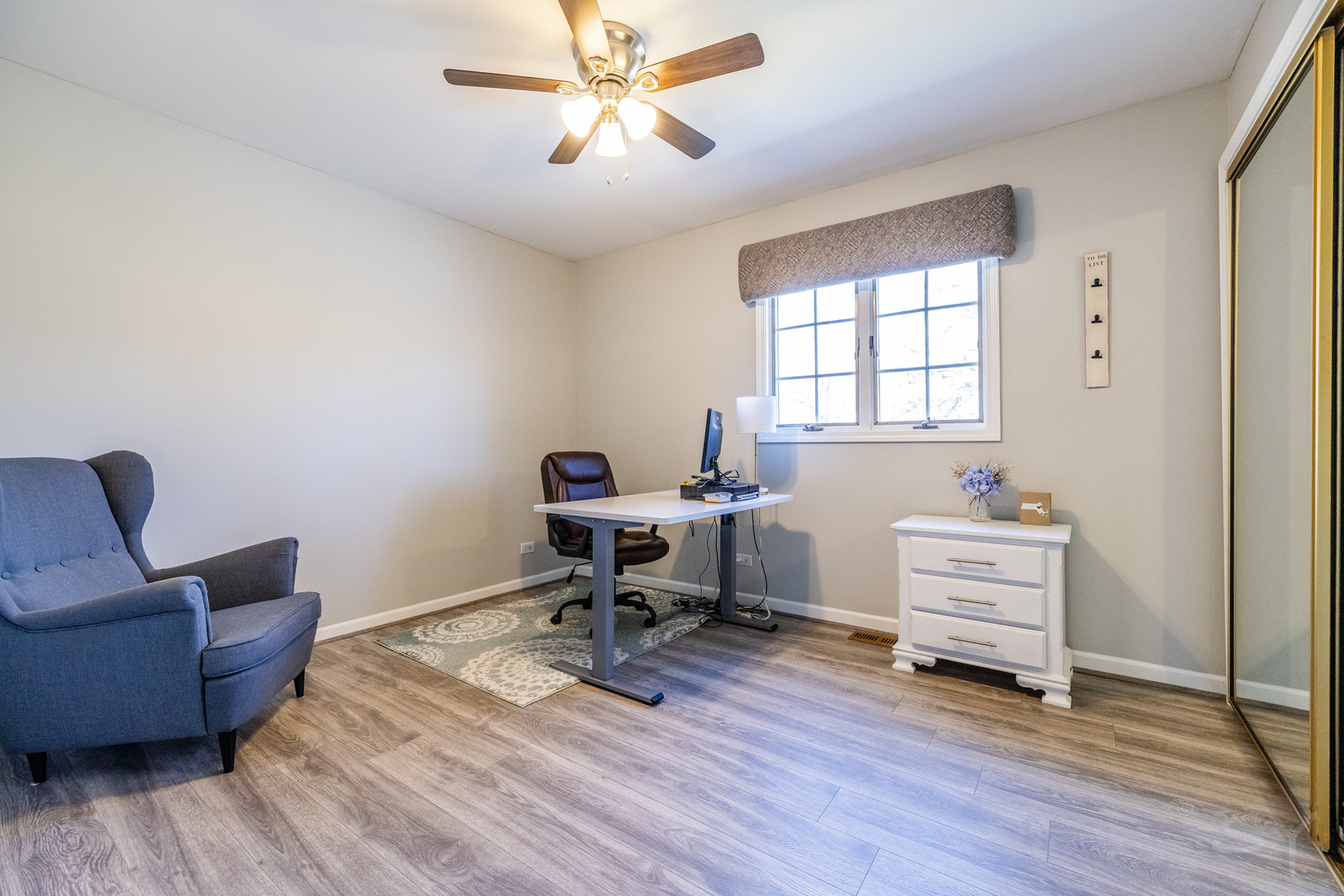 8001 William Drive Willowbrook, IL 60527 - Photo 28 of 73 a workspace with furniture hardwood and a window