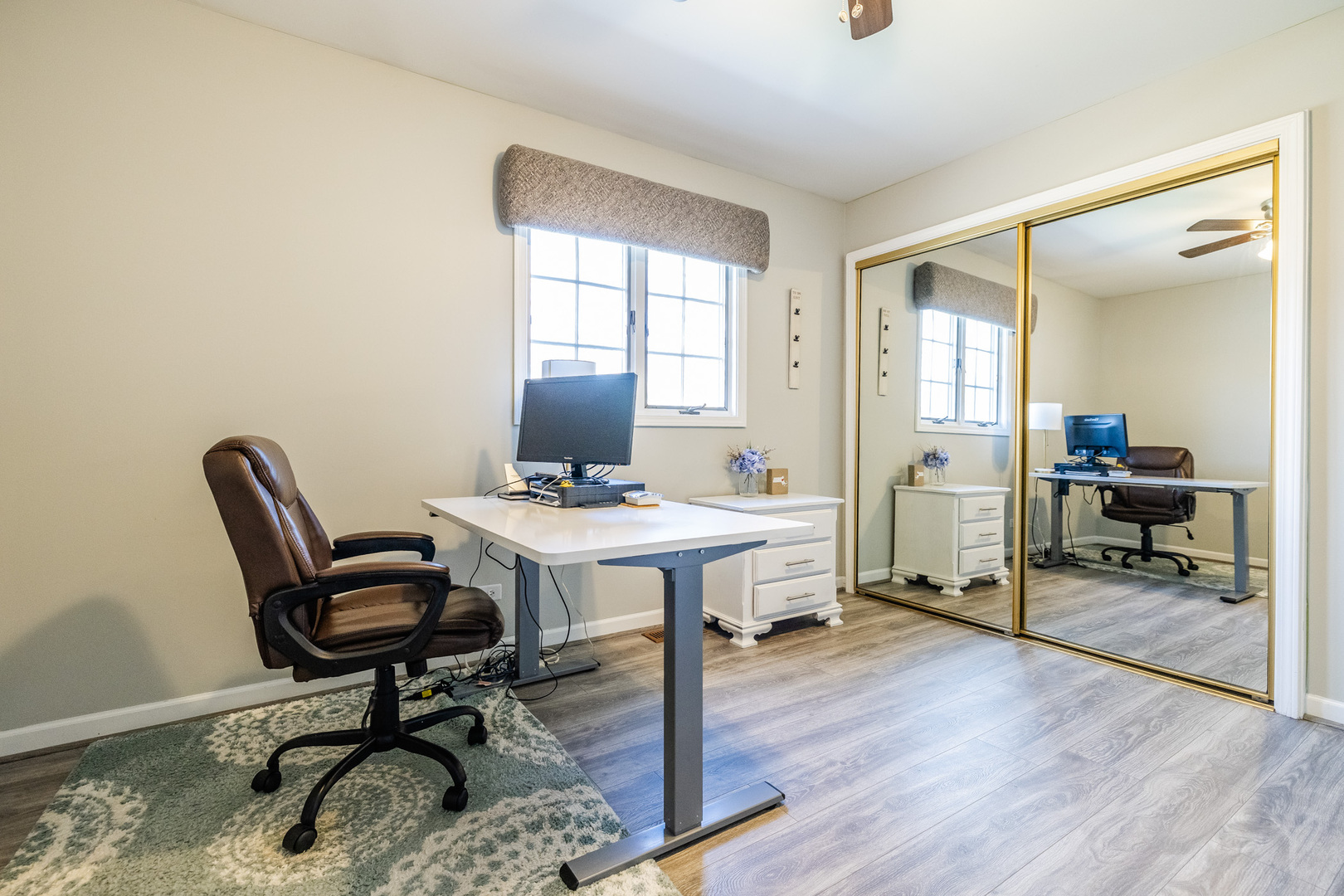 8001 William Drive Willowbrook, IL 60527 - Photo 29 of 73 a workspace with furniture and wooden floor
