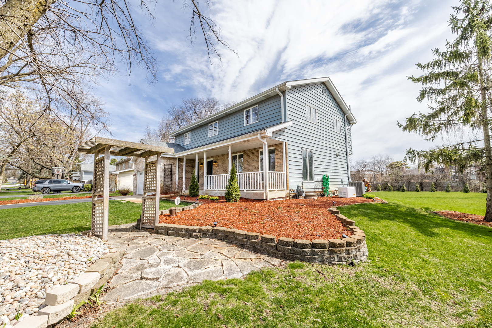 8001 William Drive Willowbrook, IL 60527 - Photo 47 of 73 a view of a house with backyard and trees