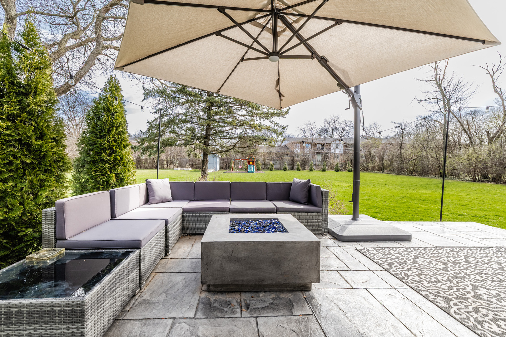 8001 William Drive Willowbrook, IL 60527 - Photo 55 of 73 a view of table and chairs under an umbrella