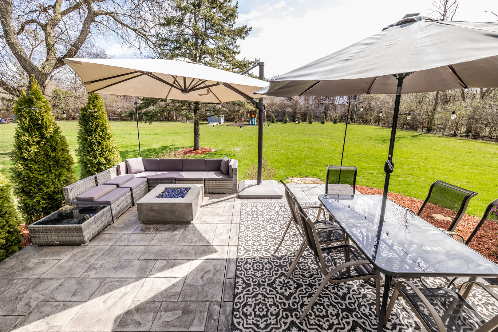 8001 William Drive Willowbrook, IL 60527 - Photo 59 of 73 a view of an outdoor sitting area with furniture and umbrella