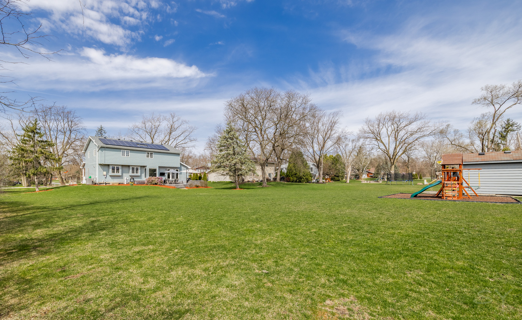 8001 William Drive Willowbrook, IL 60527 - Photo 67 of 73 a view of a big yard with palm trees