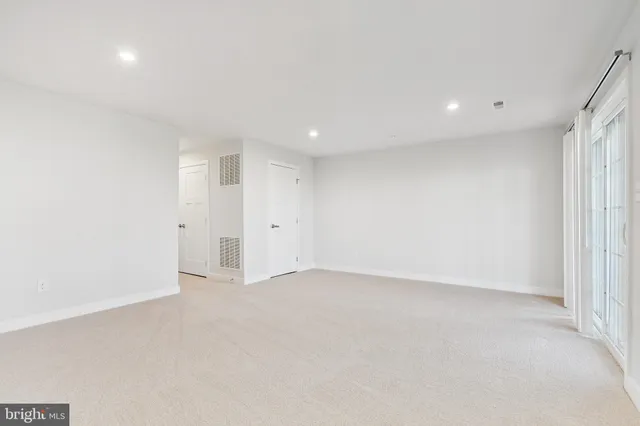 an empty room with an entryway