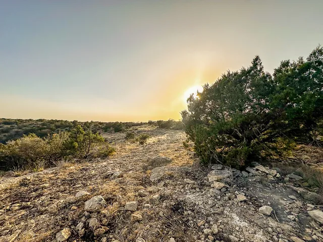 a view of water heater and wooden floor