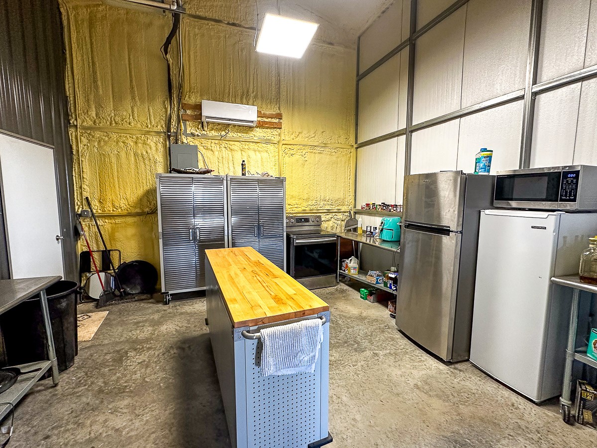 0 Marvin Road Comstock, TX 78837 - Photo 8 of 40 a view of storage and utility room with washer and dryer