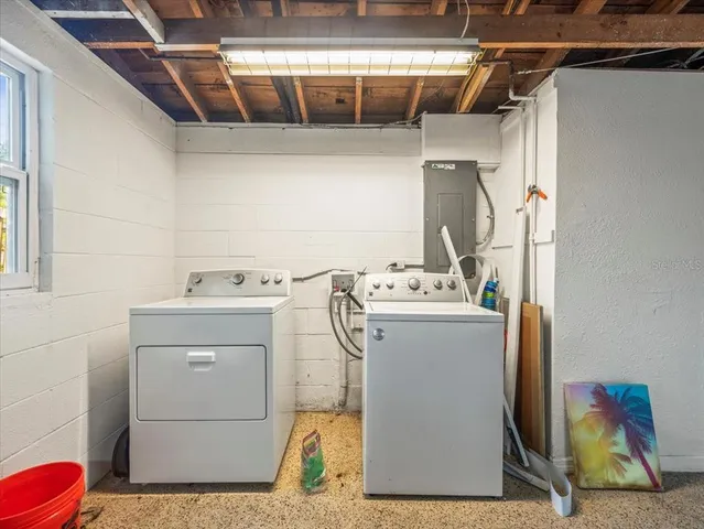 a view of yard with swimming pool and green space