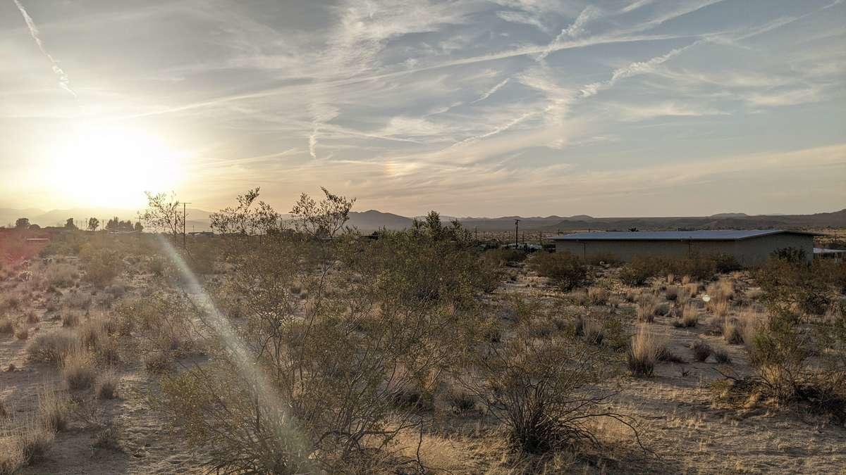6742 Mile Square Road Joshua Tree, CA 92252 - Photo 2 of 13 a view of a building