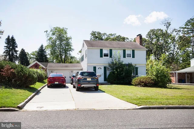 a house view with a garden space