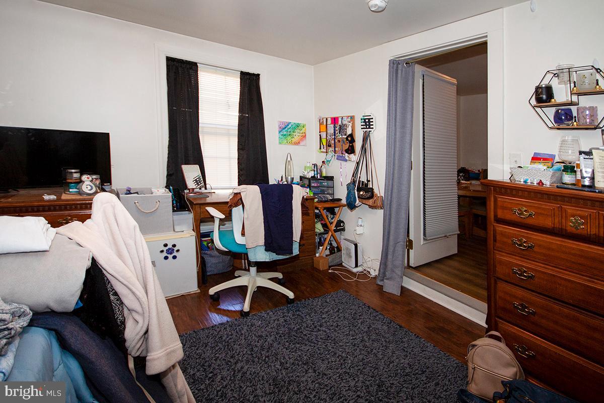 316 Swarthmore Road Glassboro, NJ 08028 - Photo 21 of 30 a living room with furniture and a flat screen tv