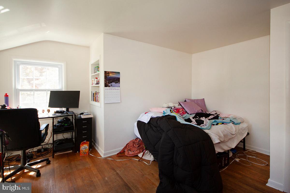 316 Swarthmore Road Glassboro, NJ 08028 - Photo 22 of 30 a view of a workspace with furniture and a window