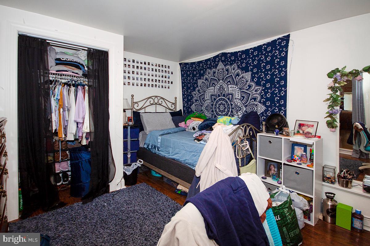316 Swarthmore Road Glassboro, NJ 08028 - Photo 24 of 30 a bed room with a bed and a book shelf