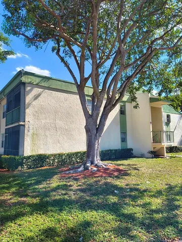 a house view with a garden space