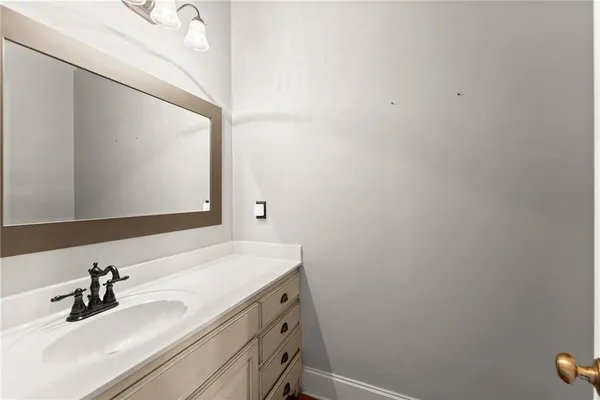 a view of storage and utility room with racks on the wall