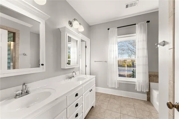 a view of a swimming pool with a lounge chairs